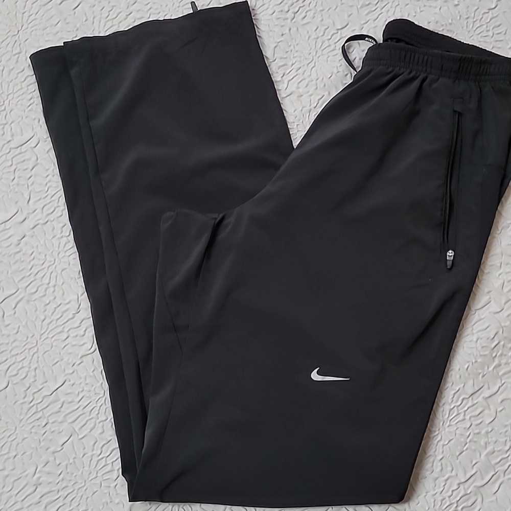 Nike Men's Dri-FIT Lightweight Zippered Cuff Versatile Pants, Black. Size S